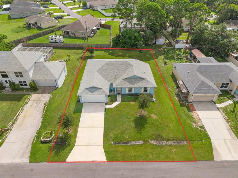 4 bedroom Single Family Residence at 936 SW Harvard Road, Port St Lucie Section 12, Port St. Lucie — photo 2