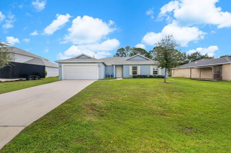 4 bedroom Single Family Residence at 936 SW Harvard Road, Port St Lucie Section 12, Port St. Lucie — photo 3
