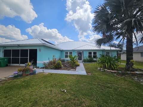 1179 SW Dorchester Street, home for sale in Port St. Lucie 34983