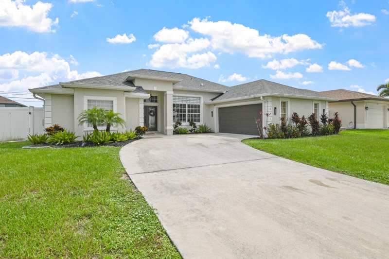 4 bedroom Single Family Residence at 1718 SW Penrose Avenue, Port St Lucie Section 19, Port St. Lucie — photo 1