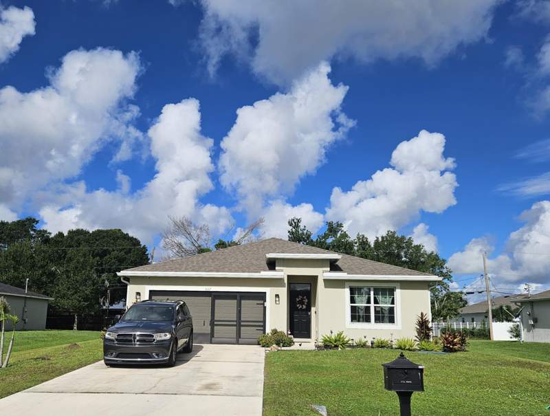 4 bedroom Single Family Residence at 1017 SW Longfellow Road, Port St Lucie Section 12, Port St. Lucie — photo 2