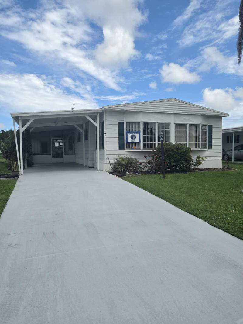 2 bedroom Mobile Home at 164 Camino Del Rio, Spanish Lakes Riverfront, Port St. Lucie — photo 2