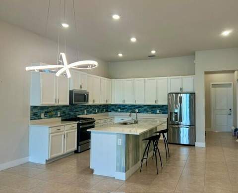 7642 N Blue Spring Drive, Parkland FL - photo 12 of 69