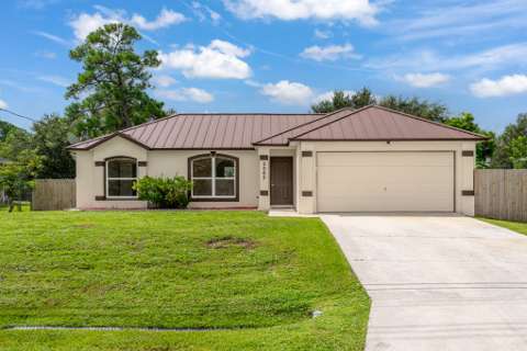 2062 SW Janette Avenue, home for sale in Port St. Lucie 34953