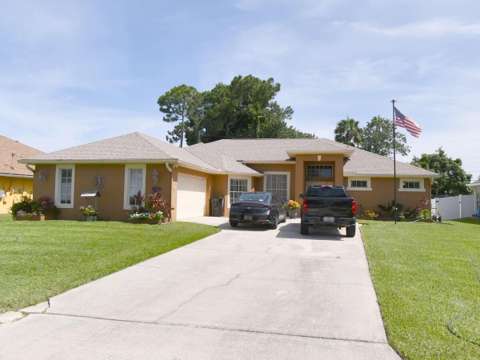 1018 SW Haleyberry Avenue, home for sale in Port St. Lucie 34953