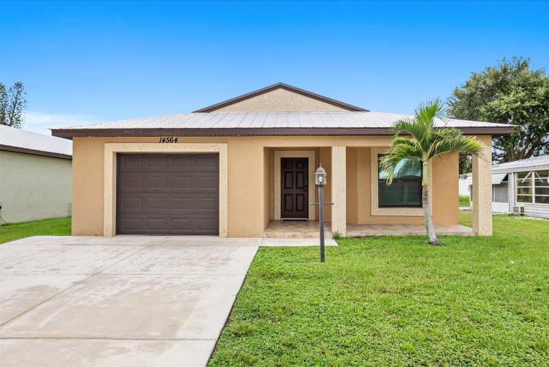 2 bedroom Single Family Residence at 14564 Dalia Avenue, Spanish Lakes Fairways Leasehold Estates, Fort Pierce — photo 1