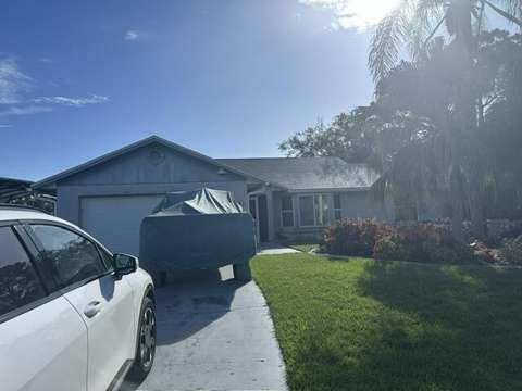 1697 SW Schleicher Lane, home for sale in Port St. Lucie 34984