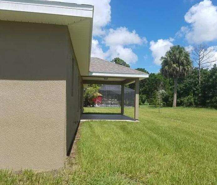 4 bedroom Single Family Residence at 702 SE Walters Terrace, Port St Lucie Section 3, Port St. Lucie — photo 1
