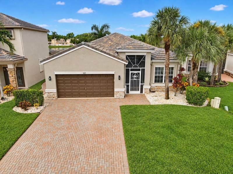 4 bedroom Single Family Residence at 5691 Saddle Trail Lane, Thoroughbred Lake Estates 1, Lake Worth — photo 2