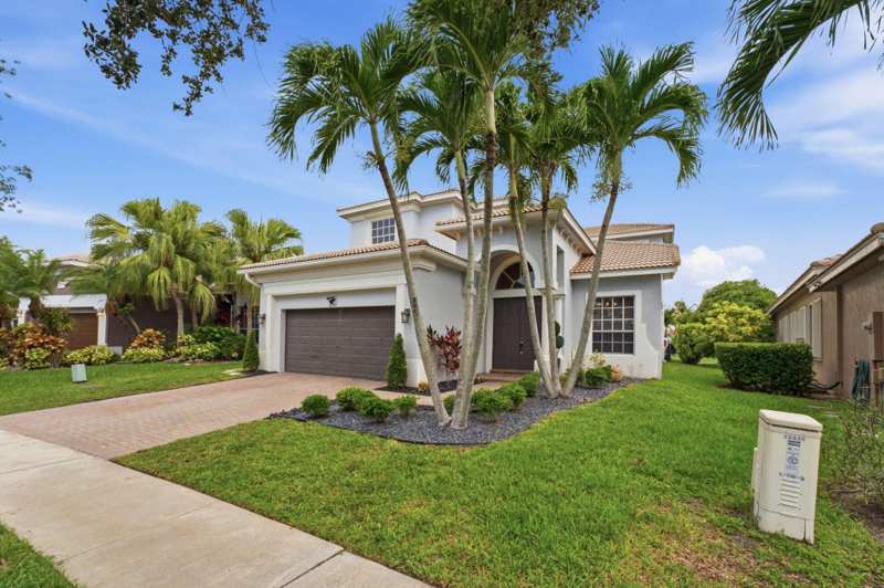 4 bedroom Single Family Residence at 12339 NW 77th Manor, Heron Bay Central, Parkland — photo 1