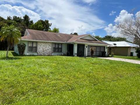 2574 SE Alfonso Avenue, home for sale in Port St. Lucie 34952