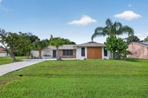 1425 SE Minorca Avenue, home for sale in Port St. Lucie 34952