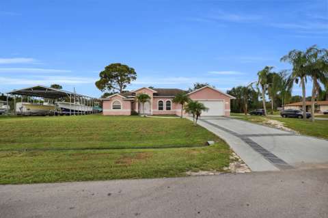 202 SE Grove Avenue, home for sale in Port St. Lucie 34983