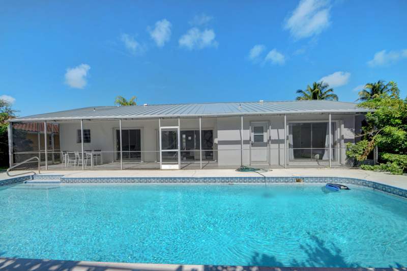 4 bedroom Single Family Residence at 1171 Bimini Lane, Palm Beach Isles 1, West Palm Beach — photo 2