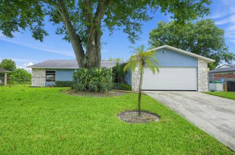 1738 SW Beeker Street, home for sale in Port St. Lucie 34953