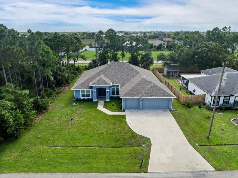 4 bedroom Single Family Residence at 5863 NW CAROVEL Avenue, PORT ST LUCIE SECTION 46 1ST REPLAT, Port St. Lucie — photo 5