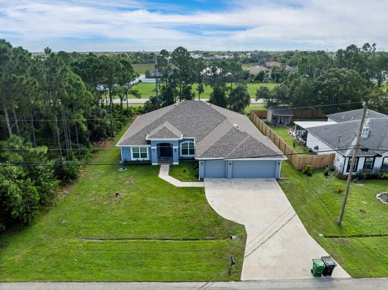 4 bedroom Single Family Residence at 5863 NW CAROVEL Avenue, PORT ST LUCIE SECTION 46 1ST REPLAT, Port St. Lucie — photo 4
