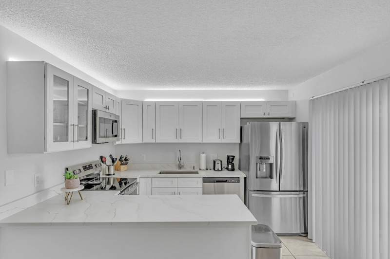 2 bedroom Townhouse at 2228 White Pine Circle #A, Pines 2, Greenacres — photo 1