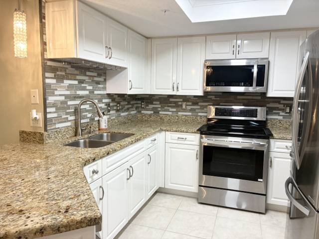 1000 CRESTWOOD Court #1005, home for sale in Royal Palm Beach