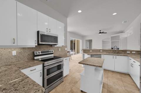 694 SW Lake Charles Circle, Port St. Lucie FL - photo 9 of 52