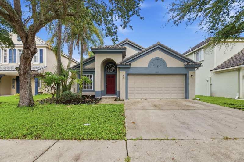 3 bedroom Single Family Residence at 9823 N Grand Duke Circle, Land Section 8, Tamarac — photo 1