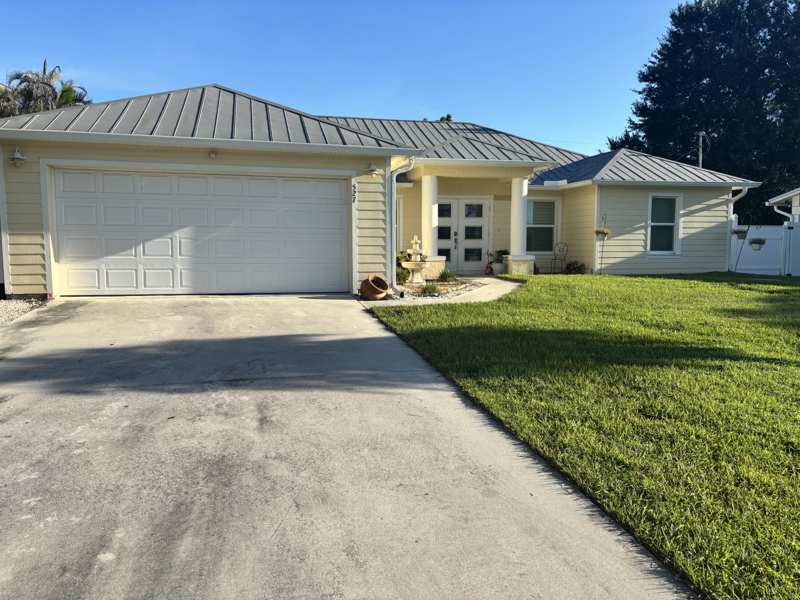 4 bedroom Single Family Residence at 527 NW Avon Avenue, Port St Lucie Section 27, Port St. Lucie — photo 1