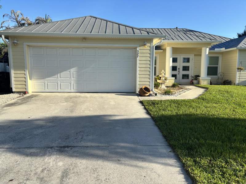 4 bedroom Single Family Residence at 527 NW Avon Avenue, Port St Lucie Section 27, Port St. Lucie — photo 2