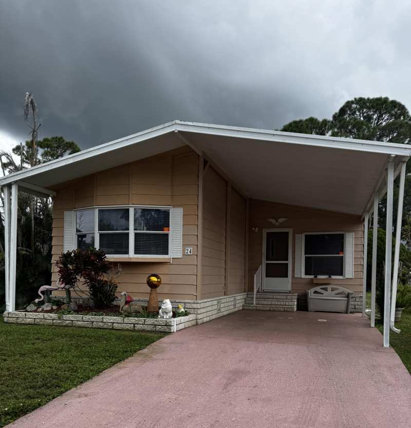 2 bedroom Manufactured Home at 24 Flores Del Norte, Spanish Lakes Country Club Village, Fort Pierce — photo 1