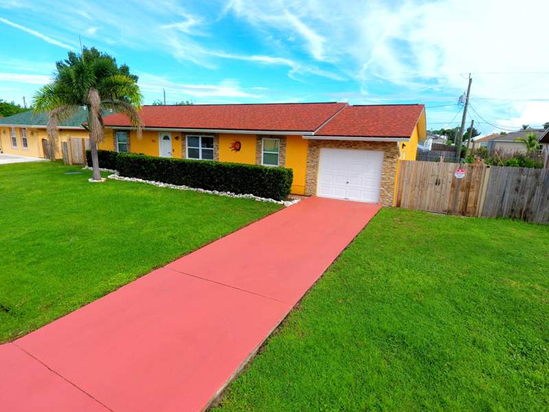 4 bedroom Single Family Residence at 751 NW Tremont Avenue, Port St Lucie Section 25, Port St. Lucie — photo 2