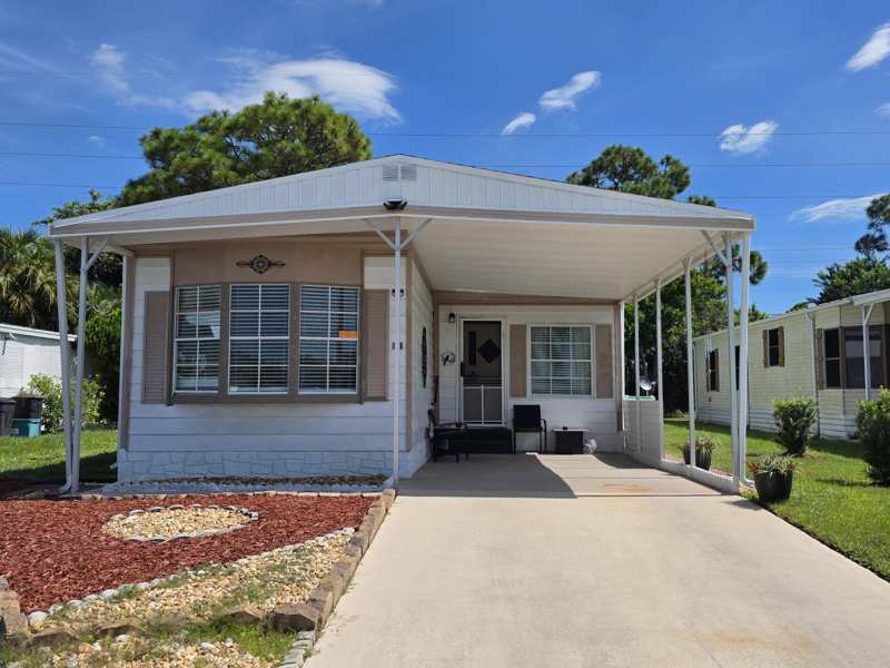 2 bedroom Manufactured Home at 14 Arboles Lane, Spanish Lakes Riverfront, Port St. Lucie — photo 1
