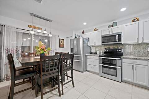 7108 Hawks Nest Terrace, Riviera Beach FL - photo 7 of 47