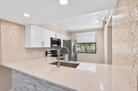 3507 Village Boulevard #105, West Palm Beach FL - photo 10 of 40