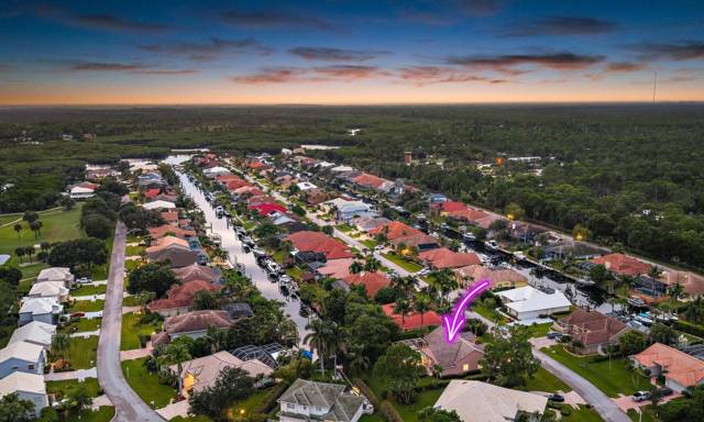 8954 SE WATER OAK Place, home for sale in Jupiter