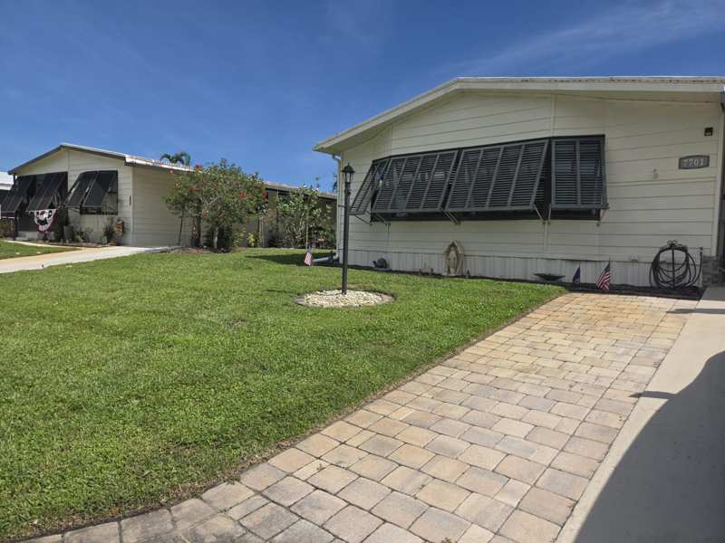 2 bedroom Manufactured Home at 7701 SE Shenandoah Drive, Cambridge At Heritage Ridge, Hobe Sound — photo 1