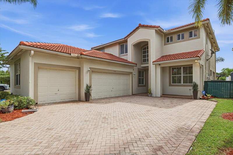5 bedroom Single Family Residence at 5341 NW 121st Avenue, Coral Shores, Coral Springs — photo 2
