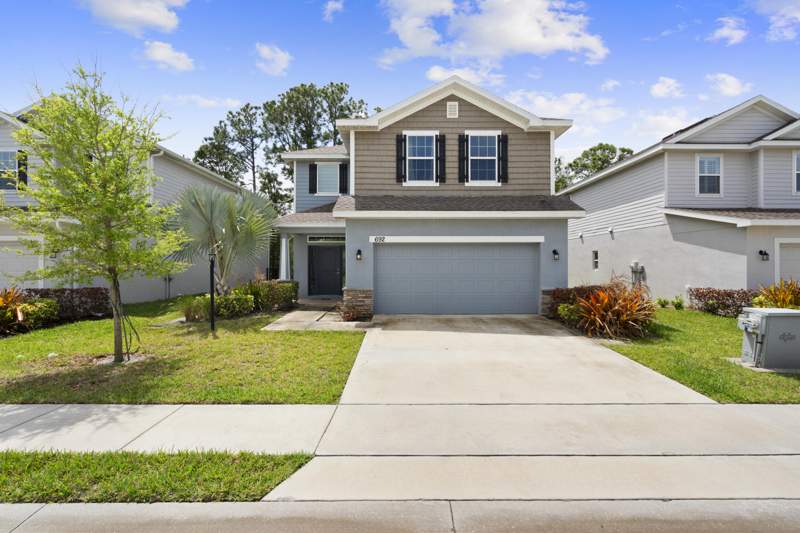 4 bedroom Single Family Residence at 692 NE Turtleback Trail, River Place On The St Lucie No 10 1st Replat, Port St. Lucie — photo 2