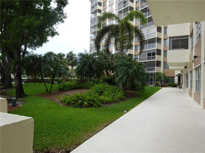1 bedroom Condominium at 10777 W Sample Road #203, Country Club Tower Of Coral, Coral Springs — photo 4