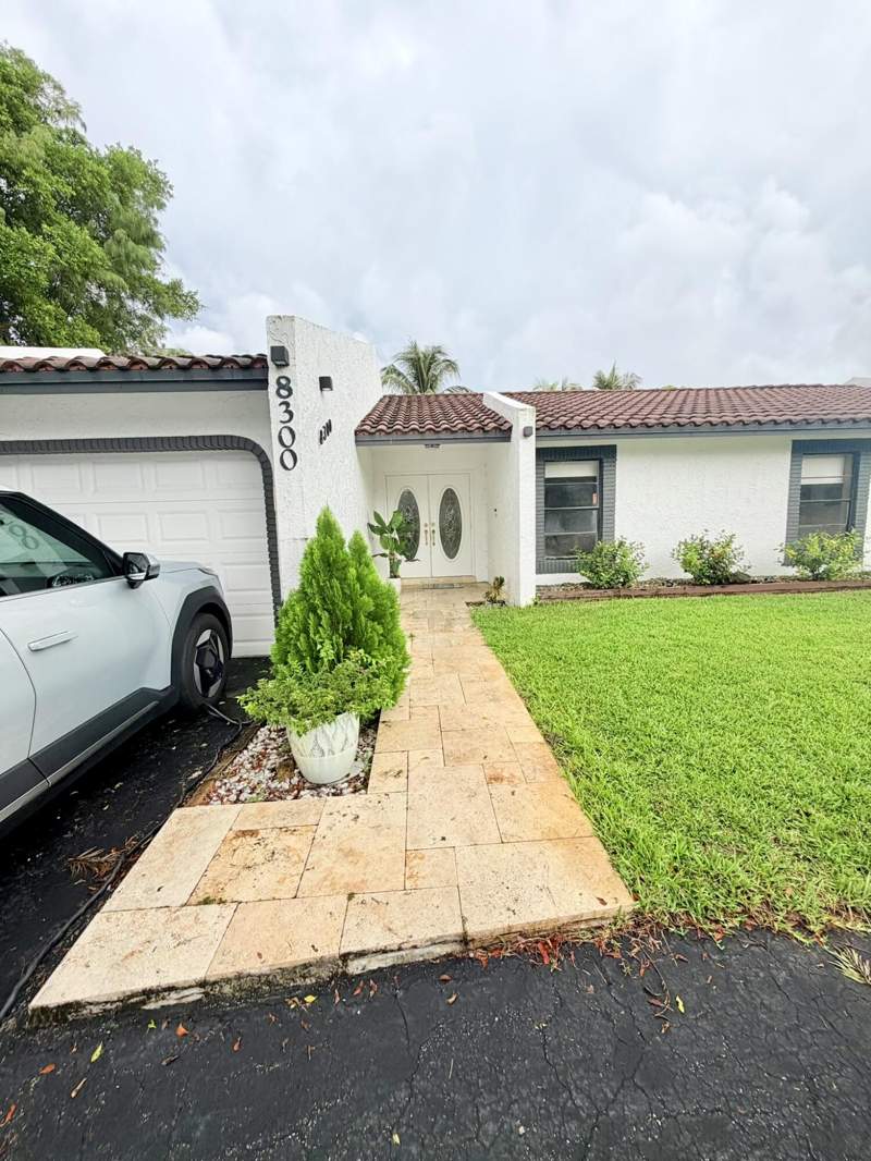 4 bedroom Single Family Residence at 8300 NW 14th Court, Countrywood Estates, Coral Springs — photo 2