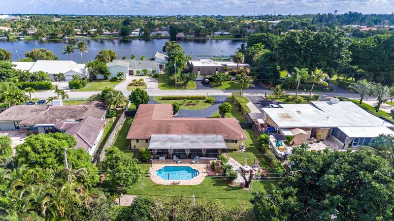 3 bedroom Single Family Residence at 7315 W Lake Drive, Fla-Mango Grovelets, West Palm Beach — photo 1