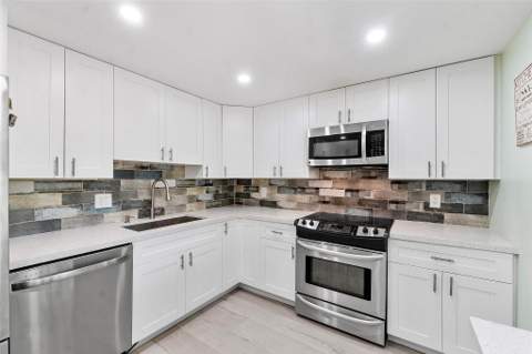 4261 W Palm Aire Drive, Pompano Beach FL - photo 10 of 49