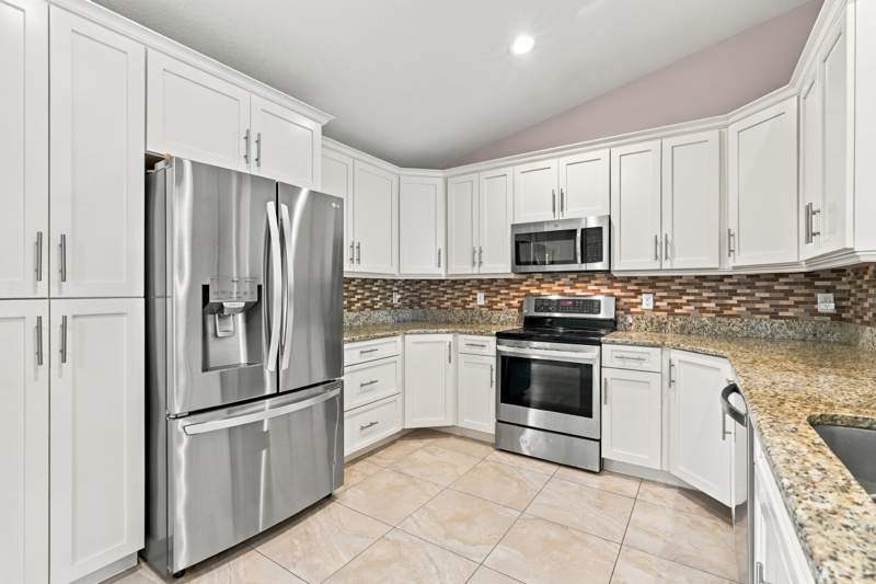 4 bedroom Single Family Residence at 1697 SE Lorraine Street, Port St Lucie Section 29, Port St. Lucie — photo 5