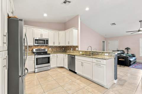 1697 SE Lorraine Street, Port St. Lucie FL - photo 6 of 32