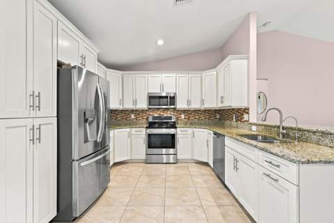 1697 SE Lorraine Street, Port St. Lucie FL - photo 10 of 32