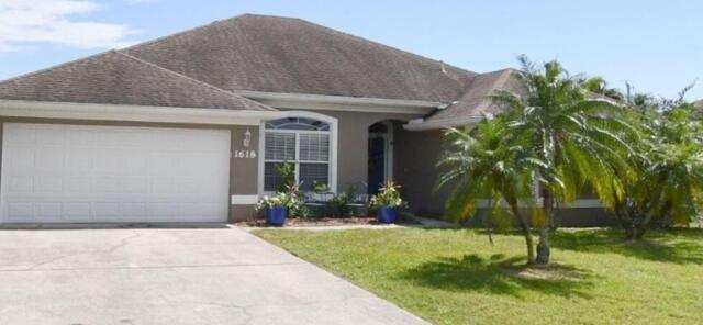 4 bedroom Single Family Residence at 1618 SW nervia Avenue, Port St Lucie Section 14, Port St. Lucie — photo 1