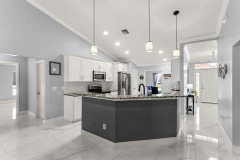 6530 NW Omega Road, Port St. Lucie FL - photo 12 of 40