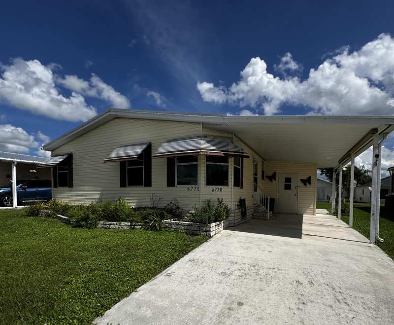 2 bedroom Manufactured Home at 6778 Tucan Street, Spanish Lakes Fairways, Fort Pierce — photo 1