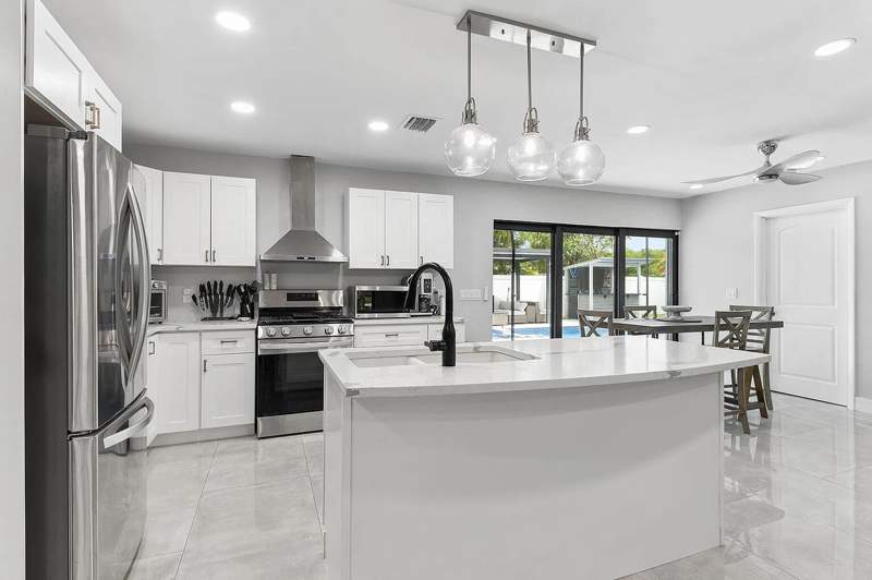 4 bedroom Single Family Residence at 405 Chapel Hill Boulevard, Mission Hill, Boynton Beach — photo 3