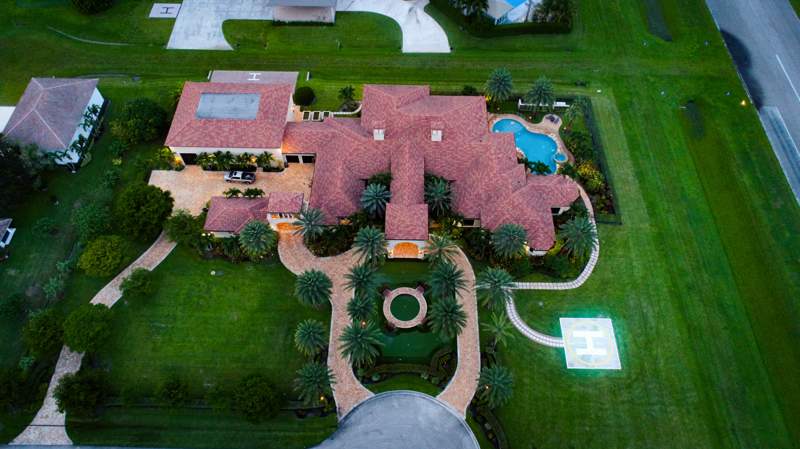 6 bedroom Single Family Residence at 15855 Barnstormer Court, Wellington Aero Club Of The Landings At Wellington, Wellington — photo 4