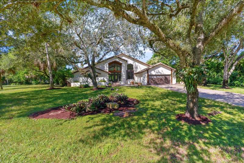 4 bedroom Single Family Residence at 6901 NW 61st Avenue, Countrys Point, Parkland — photo 1
