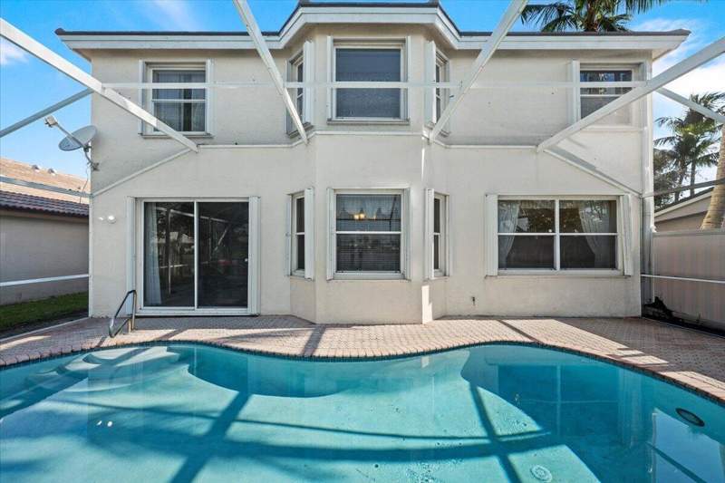 4 bedroom Single Family Residence at 7639 Northtree Club Drive, Hidden Lakes At Northtree, Greenacres — photo 3